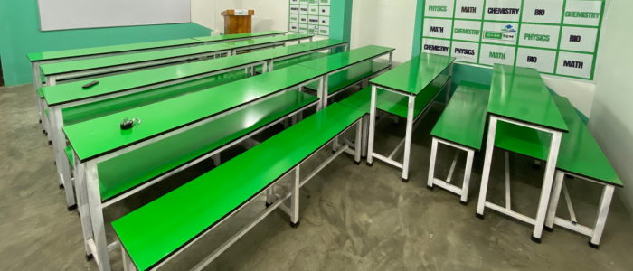 Organized learning environment inside Quantum Education PCMB coaching classroom in Guwahati.